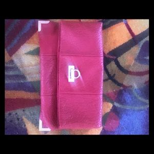 Red leather clutch with gold trim